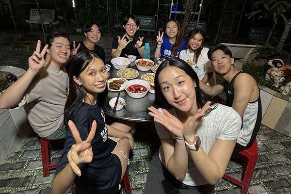 Group shot over dinner
